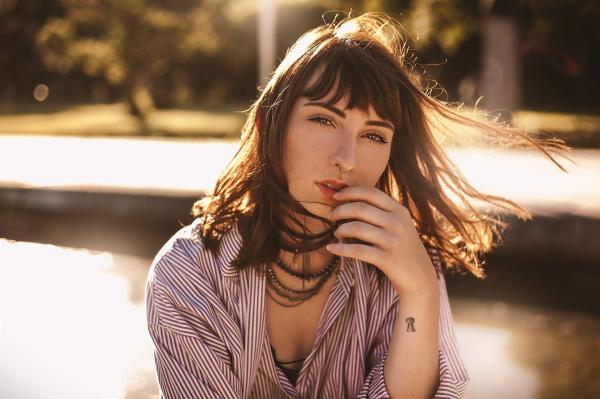 Woman in Red and White Stripes Top Photo