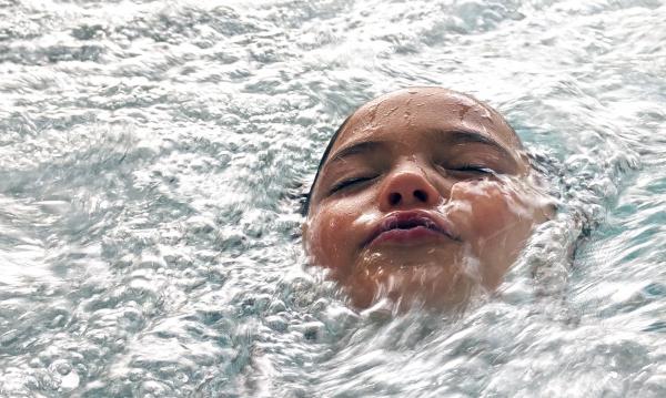 Woman on Body of Water during Daytime