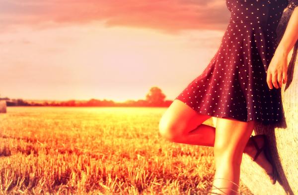 Woman Posing on Haystack - Hazy Vintage Looks with Copyspace