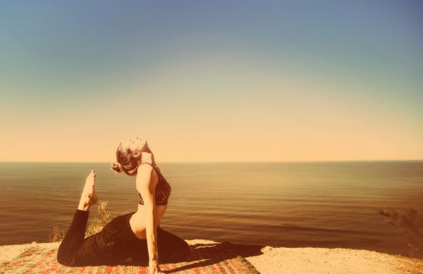 Woman Practicing Yoga by the Ocean - Metal Toned