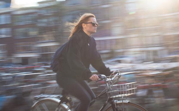 Woman Riding Bicycle