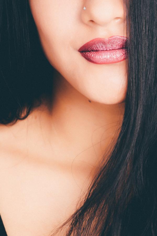 Woman Showing Red Lipstick