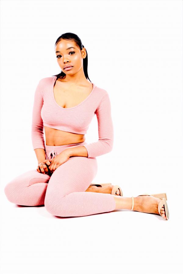 Woman Sitting Wearing Long-sleeve Crop-top and Leggings