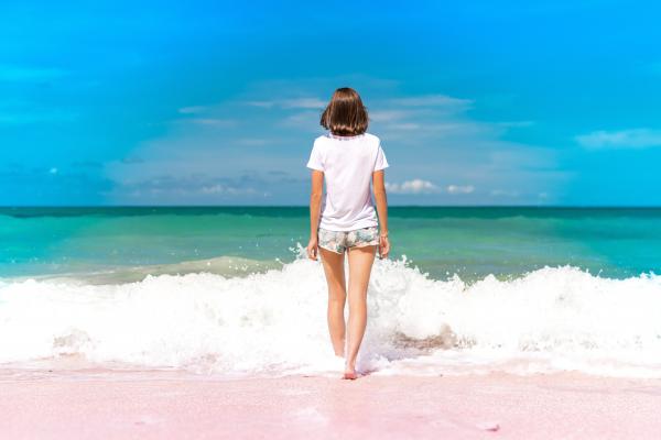 Woman Standing on Seashore