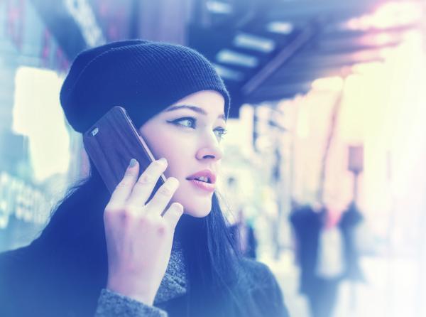 Woman Talking Through Smartphone