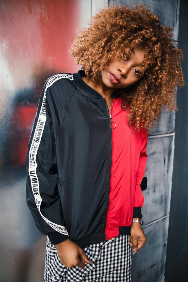 Woman Wearing Black and Red Zip-up Jacket