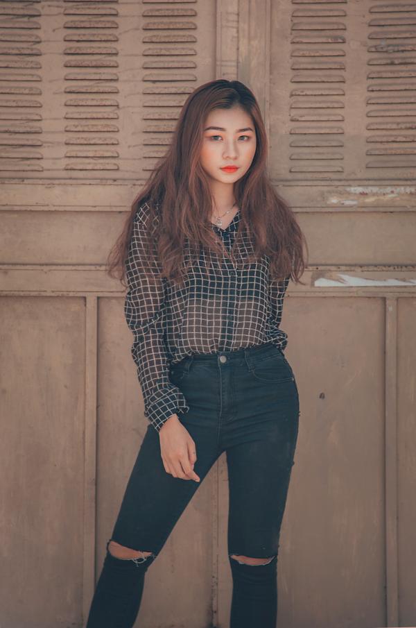 Woman Wearing Black Dress Shirt and Black Jeans
