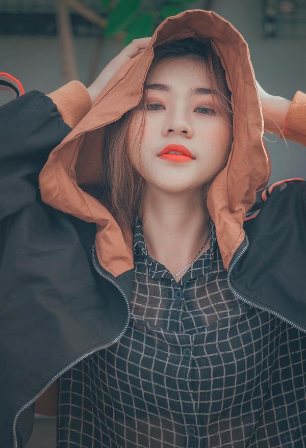 Woman Wearing Brown and Black Hoodie Jacket