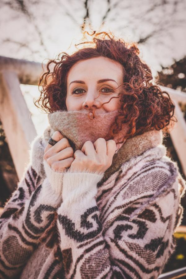 Woman Wearing Grey and Black Sweater Photo