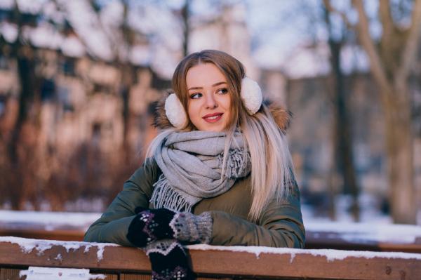 Woman Wearing Jacket Leaned on Wooden Rail