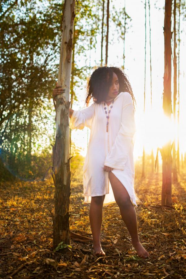 Woman Wearing Long-sleeved Shirt Standing Beside Tree