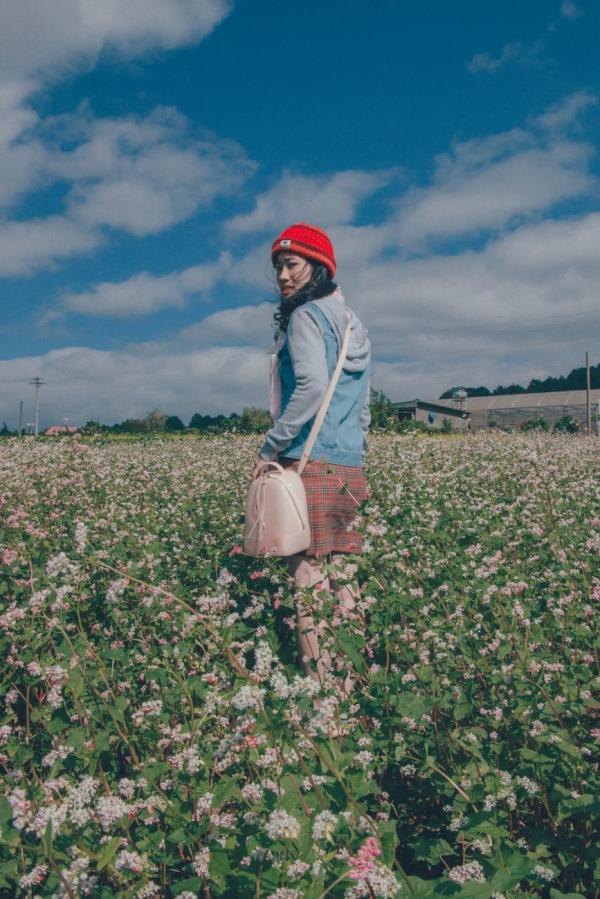 Woman Wearing Red Knit Hat and Blue Hoodie Jacket