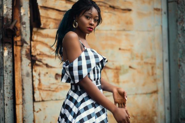 Woman Wearing White and Black Plaid Cold-shoulder Dress