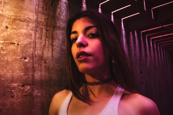 Woman Wearing White Scoop-neck Sleeveless Top and Black Choker Necklace