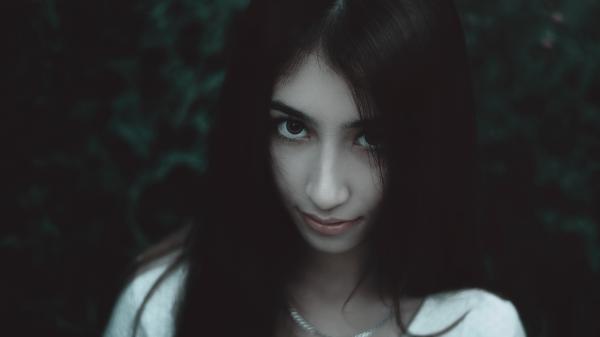 Woman Wearing White Shirt and Silver Chain Necklace
