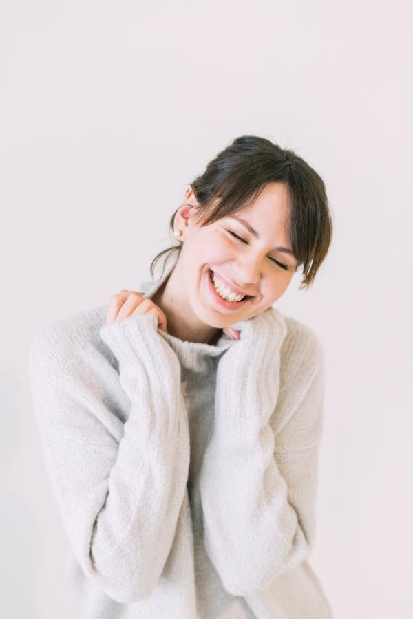 Woman Wearing White Turtle-neck Sweater