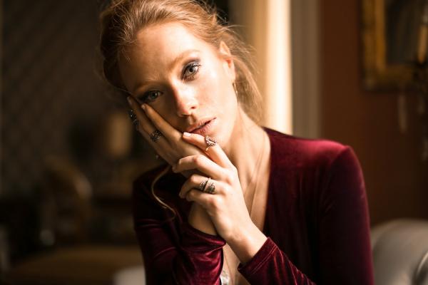 Woman With Red Long-sleeved Top