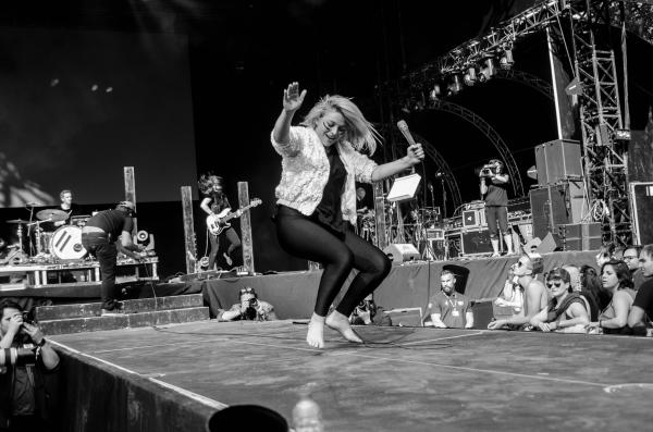 Women Dancing on Stage in Gray Scale Photography