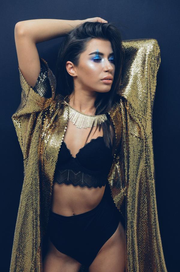 Women's Wearing Gold Sequin Cardigan