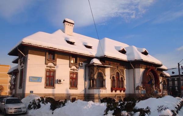 Wooden cottage in winter