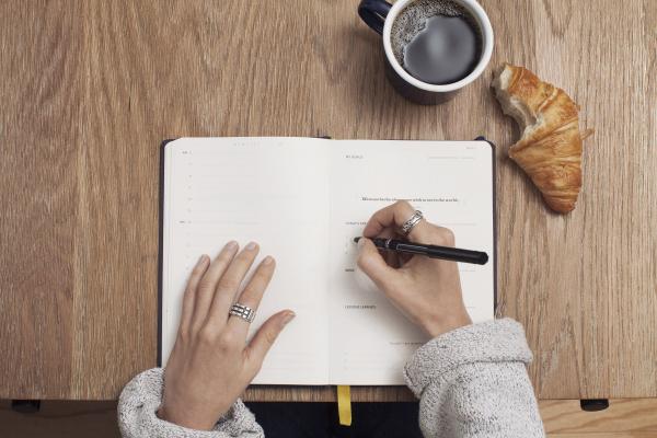 Writing in a book