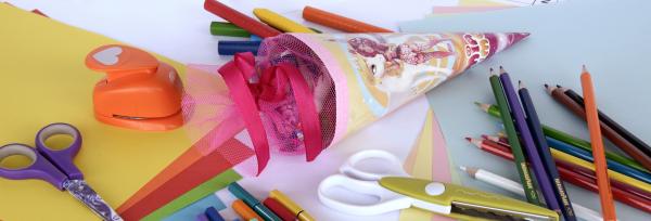 Yellow Blue Black Purple Red and Brown Coloring Pencil Near on White and Green Scissors