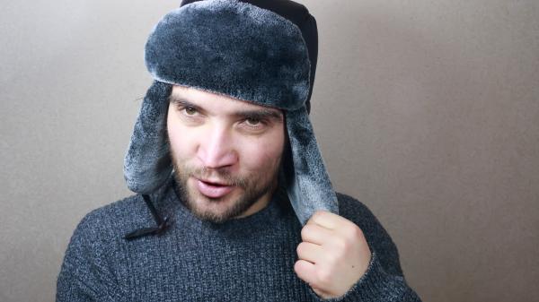 Young man dressed for winter