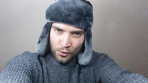 Young man dressed for winter