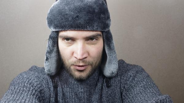 Young man dressed for winter